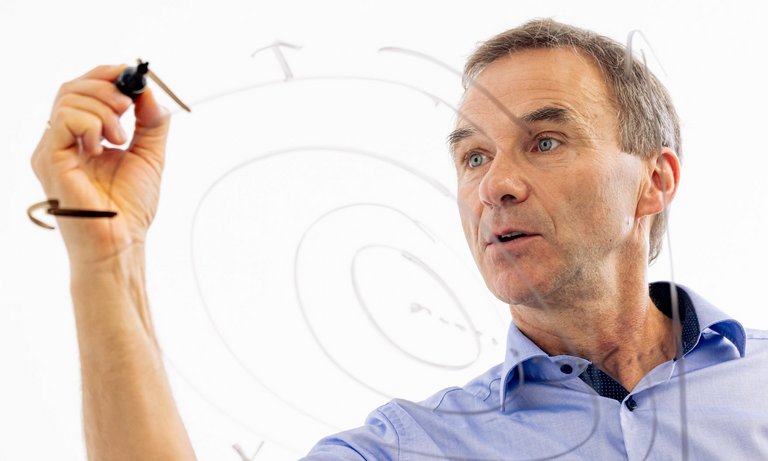 Engineer Explains Optimization Method Engineer explains an optimization method using a sketch.